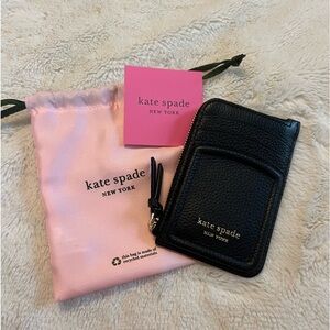 Kate Spade card holder in black knott w/ dust bag. NWT.